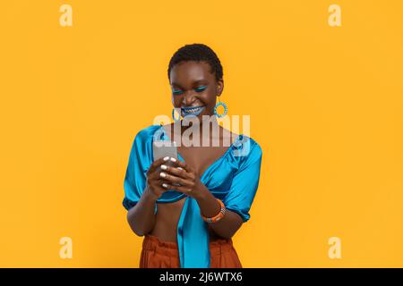 Cute black lady in love chatting with boyfriend Stock Photo