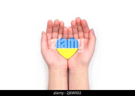 Donation concept. Heart and Ukrainian National colors with text
