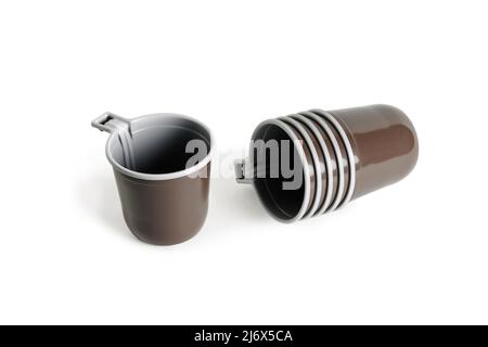 Stack of plastic cups. Close-up. Isolated on white background. Stock Photo