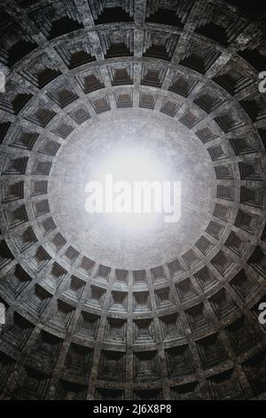 Magnificent coffered concrete dome of the Pantheon, ancient Roman temple in Rome, Italy. Stock Photo