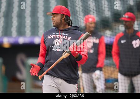 May 3 2022: Colorado first baseman C.J. Cron (25) gets a hit during the  game with Washington Nationals and Colorado Rockies held at Coors Field in  Denver Co. David Seelig/Cal Sport Medi(Credit