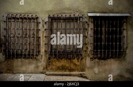 Three windows in an historic abandoned building in the medieval village of Buzet in Istria, western Croatia Stock Photo