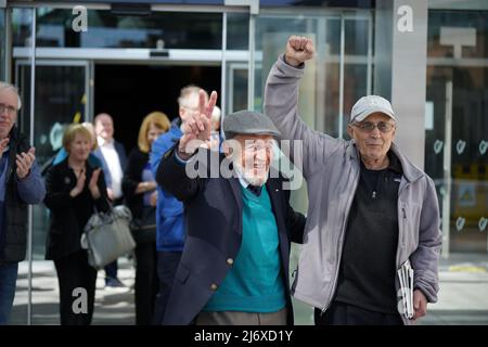 RETRANSMITTING CORRECTING NAME FROM LEN MAYERS TO KEN MAYERS US veterans Ken Mayers (left), 85, and Tarak Kauff, 80, leave Dublin Circuit Criminal Court after they were convicted of interfering with the operation of Shannon airport as part of an anti-war protest on St Patrick's Day 2019, which led to the closure of a runway. The pair, who are activists for Veterans for Peace, were acquitted of criminal damage to a perimeter fence and of trespassing with the intent to commit an offence or interfere with property. Picture date: Wednesday May 4, 2022. Stock Photo
