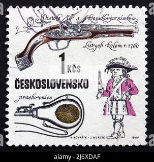 CZECHOSLOVAKIA - CIRCA 1969: a stamp printed in the Czechoslovakia shows Flintlock Pistol, Devieuxe Workshop, Liege, c. 1760, Historical Firearm, circ Stock Photo