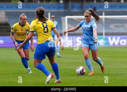 Manchester City's Georgia Stanway (right) in action with Birmingham City's Libby Smith (left) and Lisa Robertson during the Barclays FA Women's Super League match at the City Football Academy, Manchester. Picture date: Wednesday May 4, 2022. Stock Photo