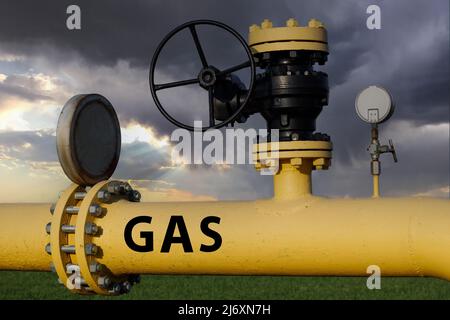 Large yellow gas transmission pipe, valve. Gas crisis concept. Stock Photo