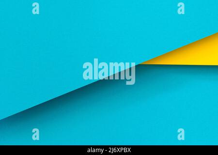 Abstract color papers geometry flat lay composition background with blue and yellow tones Stock Photo