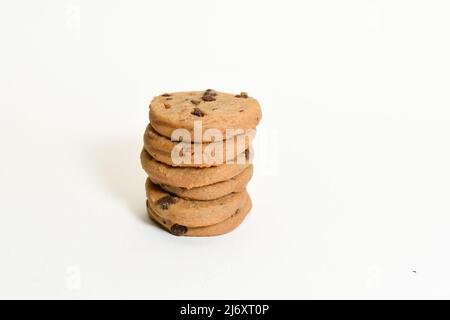 Stack of yummy tasty chocolate chip cookies isolated on a white background Stock Photo