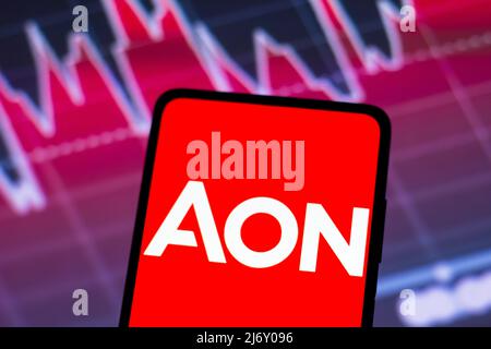 In this photo illustration, an Aon plc logo is seen displayed on a ...