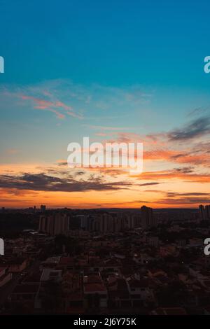 Sunrise in Ribeirao Preto City in Brazil. Skyline silhouette with sunset. Stock Photo