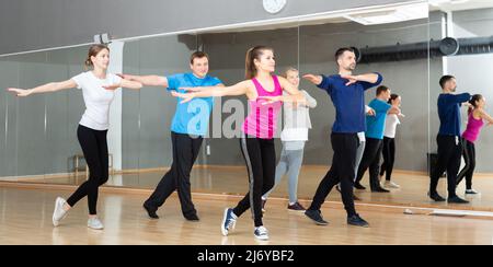 People practicing vigorous dance Stock Photo