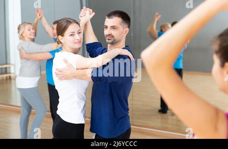 Adults learning to dance kizomba Stock Photo