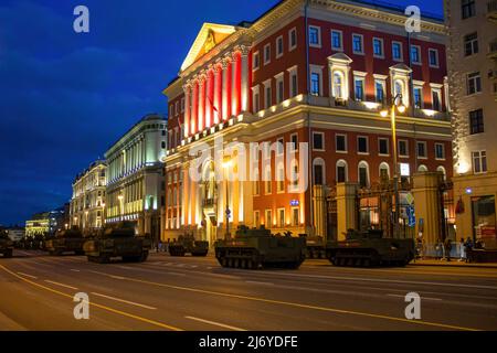 The T-14 Armata tanks seen in formations in front of the mayor's residence on Tverskaya street in Moscow. The final night rehearsal of the traditional Victory Day Parade is one of the main runs before the actual event scheduled for May 9. Besides its symbolic meaning, the yearly Victory Day Parade has been a tool to demonstrate Russia's new weaponry to potential adversaries. Stock Photo