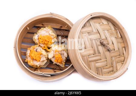 Freshly steamed siew mai or shaomai is poular Cantonese Chinese dim sum delicacy Stock Photo