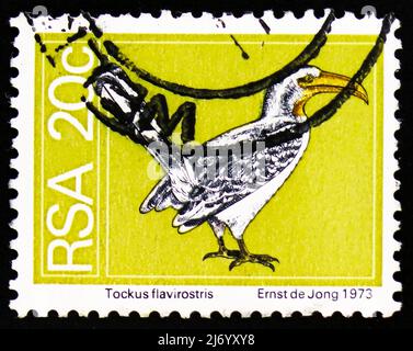 MOSCOW, RUSSIA - MARCH 27, 2022: Postage stamp printed in South Africa shows Southern Yellow-billed Hornbill (Tockus leucomelas), Definitives Flora an Stock Photo