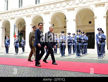 (220505) -- ROME, May 5, 2022 (Xinhua) -- Italian Prime Minister Mario Draghi (R, front) welcomes Japanese Prime Minister Fumio Kishida (L, front) in Rome, Italy on May 4, 2022. The leaders of Italy and Japan on Wednesday said they would push for a negotiated settlement to the Ukraine conflict. (Photo by Alberto Lingria/Xinhua) Stock Photo