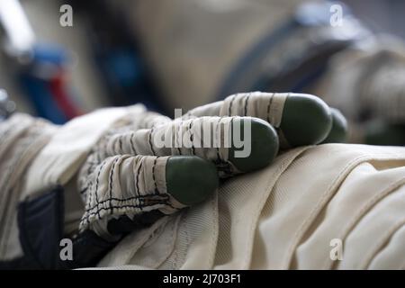 Astronaut space suit gloves close up detail Stock Photo