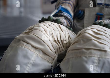 Astronaut space suit gloves close up detail Stock Photo