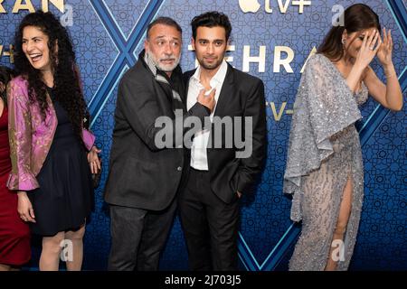 (L-R) Behi Djanati Atai, Vassilis Koukalani, Elnaaz Norouz, and Arash Marand attend the red carpet event for the season two premiere of Apple’s “Tehran” at the Robin Williams Center in New York, New York, on May 4, 2022. (Photo by Gabriele Holtermann/Sipa USA) Stock Photo