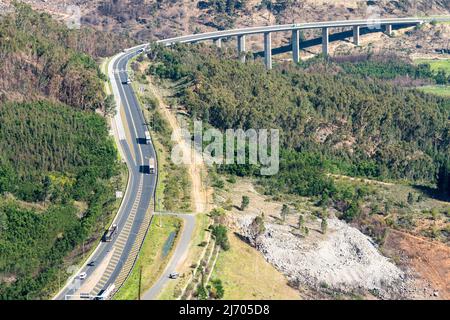 aerial view, looking down on the N1 highway and elevated bridge which leads to the Huguenot tunnel in Western Cape,South Africa concept infrastructure Stock Photo