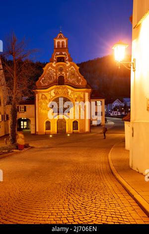 Germany Bavaria Romantic Road. Fussen. Heilig-Geist-Spitalkirche (Holy Spirit Hospital Church) and its rococo painted facade Stock Photo