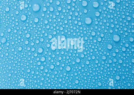 Water drops on blue background, top view of pattern with drop, flat lay as overlay Stock Photo