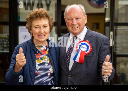 TUV leader Jim Allister with his wife Ruth give a thumbs up as they arrive at Kells and Connor Primary School, Ballymena, Antrim, to cast their vote in the 2022 NI Assembly election. Picture date: Thursday May 5, 2022. Stock Photo