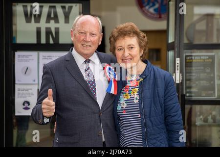 TUV leader Jim Allister with his wife Ruth arriving at Kells and Connor Primary School, Ballymena, Antrim, to cast their vote in the 2022 NI Assembly election. Picture date: Thursday May 5, 2022. Stock Photo