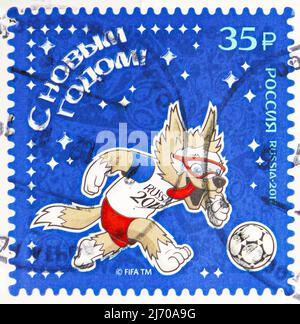 MOSCOW, RUSSIA - AUGUST 6, 2021: Postage stamp printed in Russia shows Run, Happy New Year 2018 ! serie, circa 2017 Stock Photo