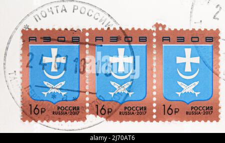 MOSCOW, RUSSIA - AUGUST 6, 2021: Postage stamp printed in Russia shows Coat of Arms of the City of Azov, serie, circa 2017 Stock Photo