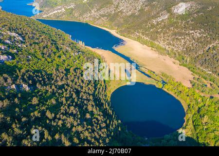 Aerial view of Torak lake spring in the Cikola River canyon, Croatia ...