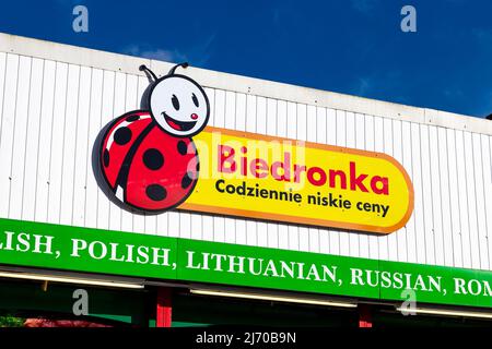 Sign on the facade of Polish supermarket chain Biedronka in King's Lynn, Norfolk, UK Stock Photo
