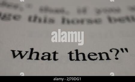What then text in open book page, selective focus, close up, macro shot of English message, education idea and novel concept, sitting view Stock Photo