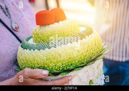 Bride price golden ring money and other treasure groom gift to girl parents in Thai wedding culture. Stock Photo