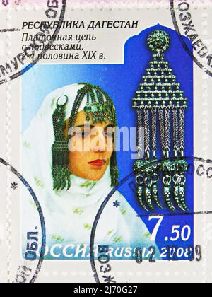 MOSCOW, RUSSIA - JUNE 10, 2021: Postage stamp printed in Russia shows Kerchief Chain with Pendants, XIX c., Decorative-Applied Arts of Dagestan serie, Stock Photo