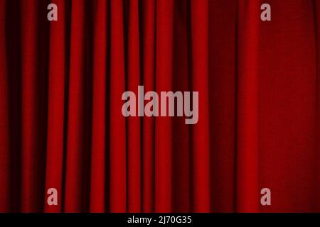 closeup red curtain wave texture pattern for background Stock Photo