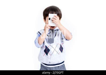 little boy Disposable Film Cameras on white background Stock Photo - Alamy