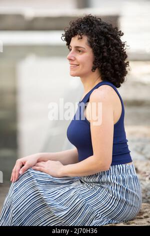 Beautiful woman smiling outdoors Stock Photo