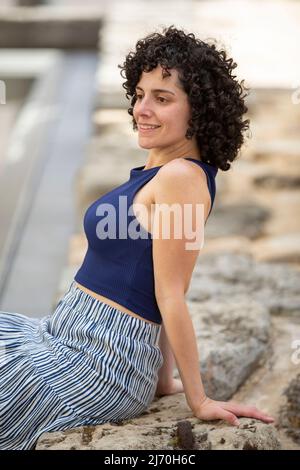 Beautiful woman smiling outdoors Stock Photo