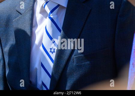 05 May 2022, Saxony-Anhalt, Magdeburg: A Star of David is seen on the necktie of Wadim Laiter, chairman of the board of the Magdeburg Synagogue Community, during a symbolic groundbreaking ceremony. A new synagogue is to be built in the center of the city by the end of 2023. On the occasion of the start of the new construction, the symbolic groundbreaking ceremony took place this morning. Photo: Klaus-Dietmar Gabbert/dpa Stock Photo