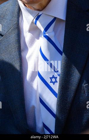 05 May 2022, Saxony-Anhalt, Magdeburg: A Star of David is seen on the necktie of Wadim Laiter, chairman of the board of the Magdeburg Synagogue Community, during a symbolic groundbreaking ceremony. A new synagogue is to be built in the center of the city by the end of 2023. On the occasion of the start of the new construction, the symbolic groundbreaking ceremony took place this morning. Photo: Klaus-Dietmar Gabbert/dpa Stock Photo