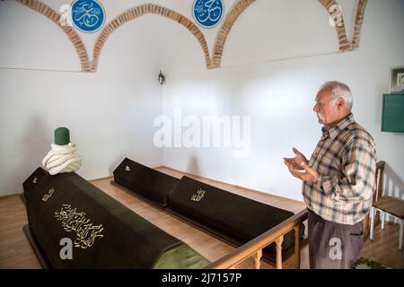 Ankara,Turkey - 05-10-2016:Man praying at Tapduk Emre tomb Stock Photo