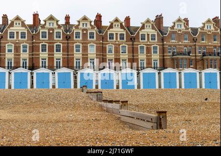 Dutch Inspired Gable Houses with Beach Huts in the Foreground on the sea front at Bexhill-on-Sea, East Sussex, England Stock Photo