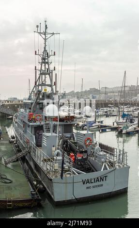 A border force vessel in Ramsgate after returning from assisting migrants near Dover, calm weather days in May 22, red life jackets visible on board Stock Photo