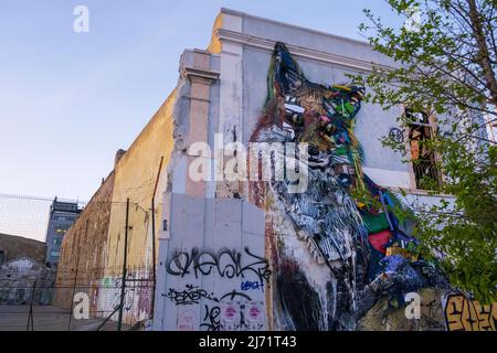 Fox made from recycled material on a wall in Lisbon, Portugal Stock Photo