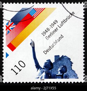 GERMANY - CIRCA 1999: a stamp printed in the Germany shows Berlin Airlift, Supplies for the People in West Berlin, 1948-1949, circa 1999 Stock Photo