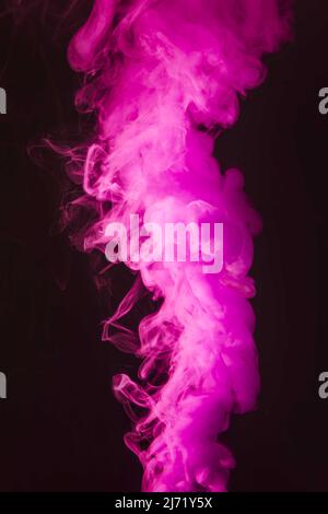 Dense purple an pink smoke on a black isolated background. Background of smoke  vape Stock Photo - Alamy