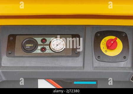 Control Panel Pressure Gauge at Compact Portable Air Compressor Stock Photo