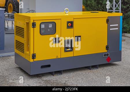 Emergency Auxiliary Electric Power Generator Diesel Unit Yellow Stock Photo