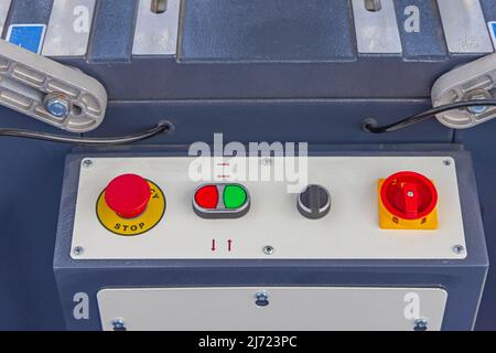 Simple Machine Operation Panel Push Buttons and Emergency Stop Control Stock Photo